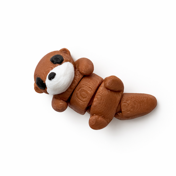 Otter (Face Up) flexi figure, 3D printed by Printies