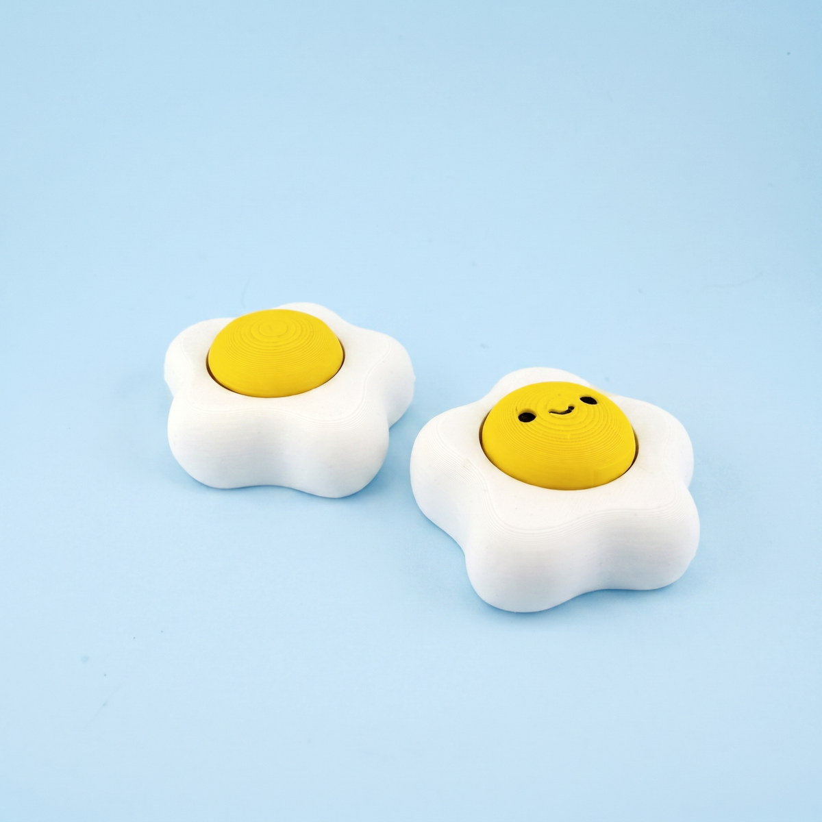 Fried egg fidget clicker - classic and smiley face
