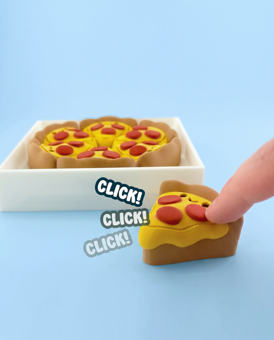 Pizza slice fidget clicker being pressed, with its pizza box