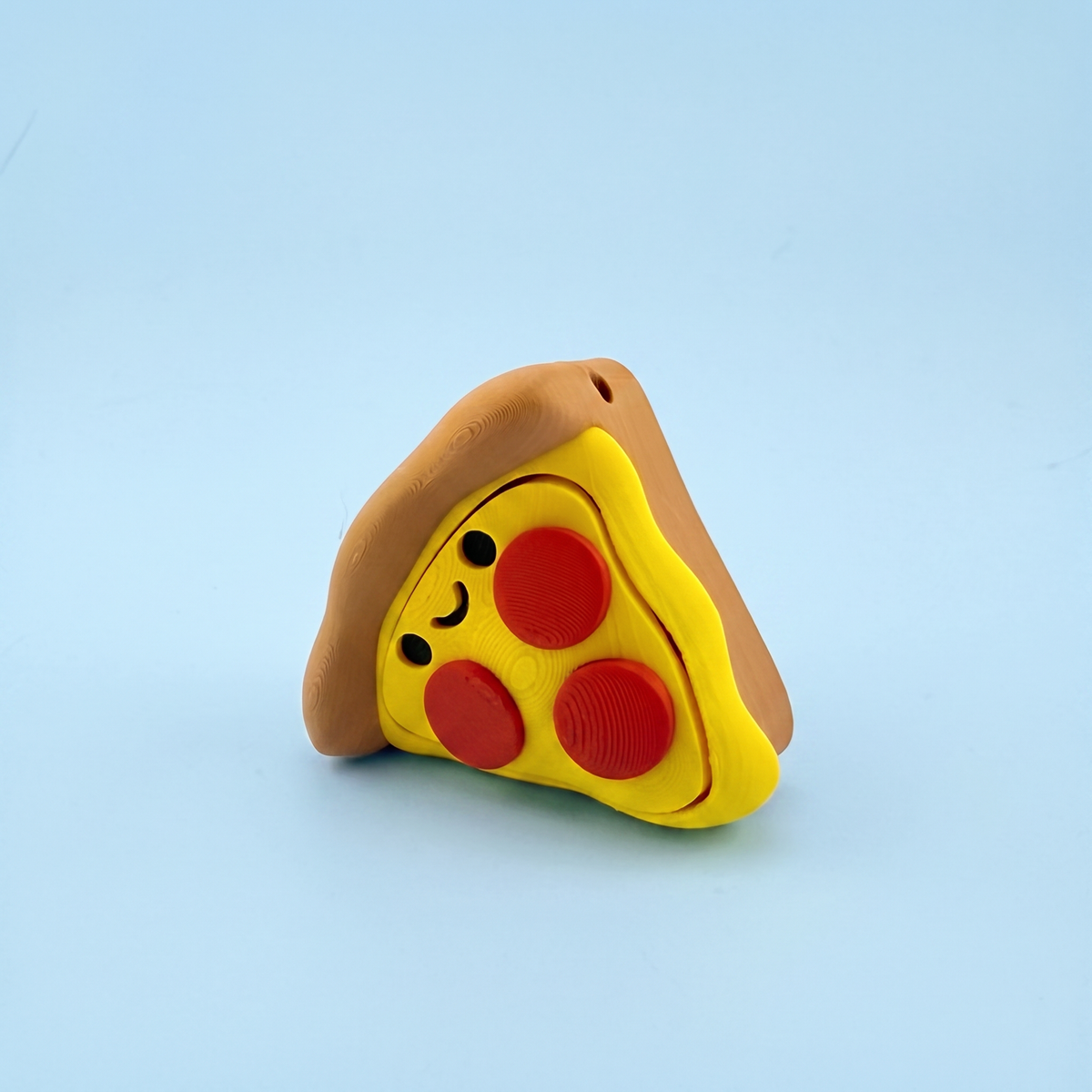 Pizza slice fidget clicker with smiley face