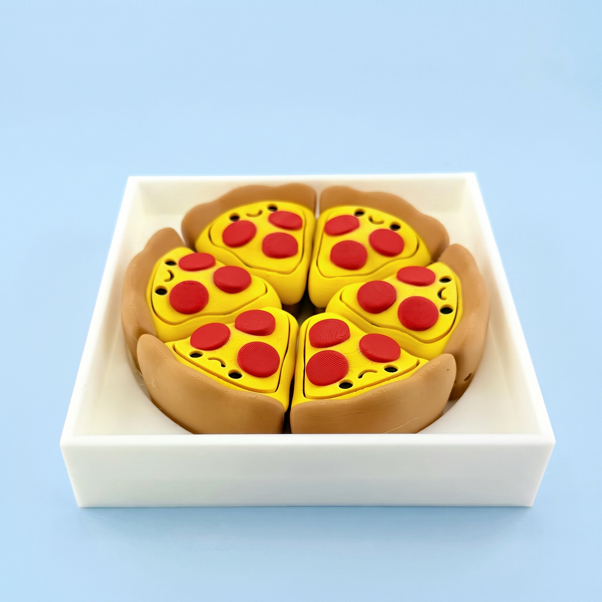 Full pizza of clicker slices in the printed pizza box