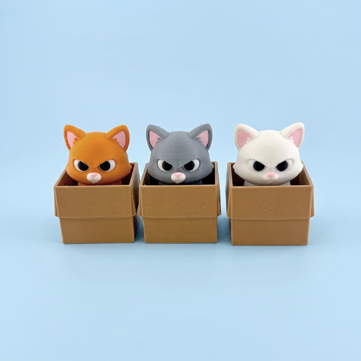 Box Cat fidget clicker in all three colours - orange, grey and white