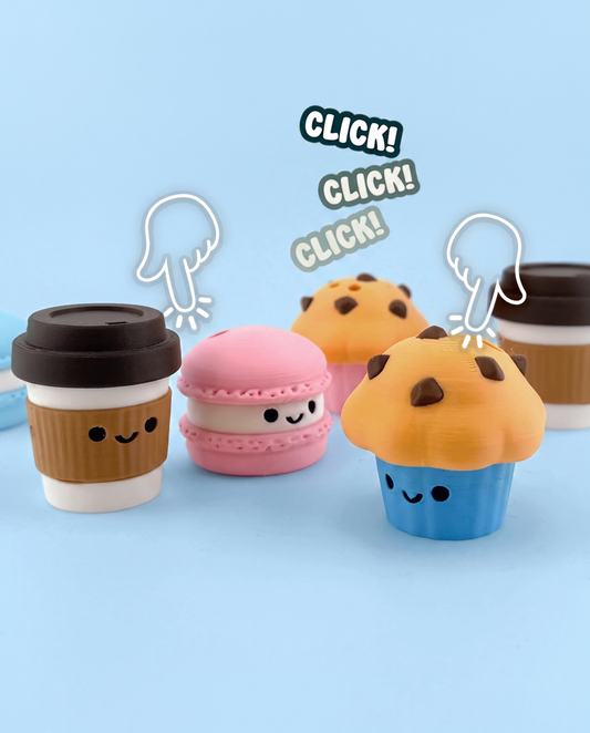 Cafe food fidget clickers - muffin, macaron and coffee cup being pressed with a click