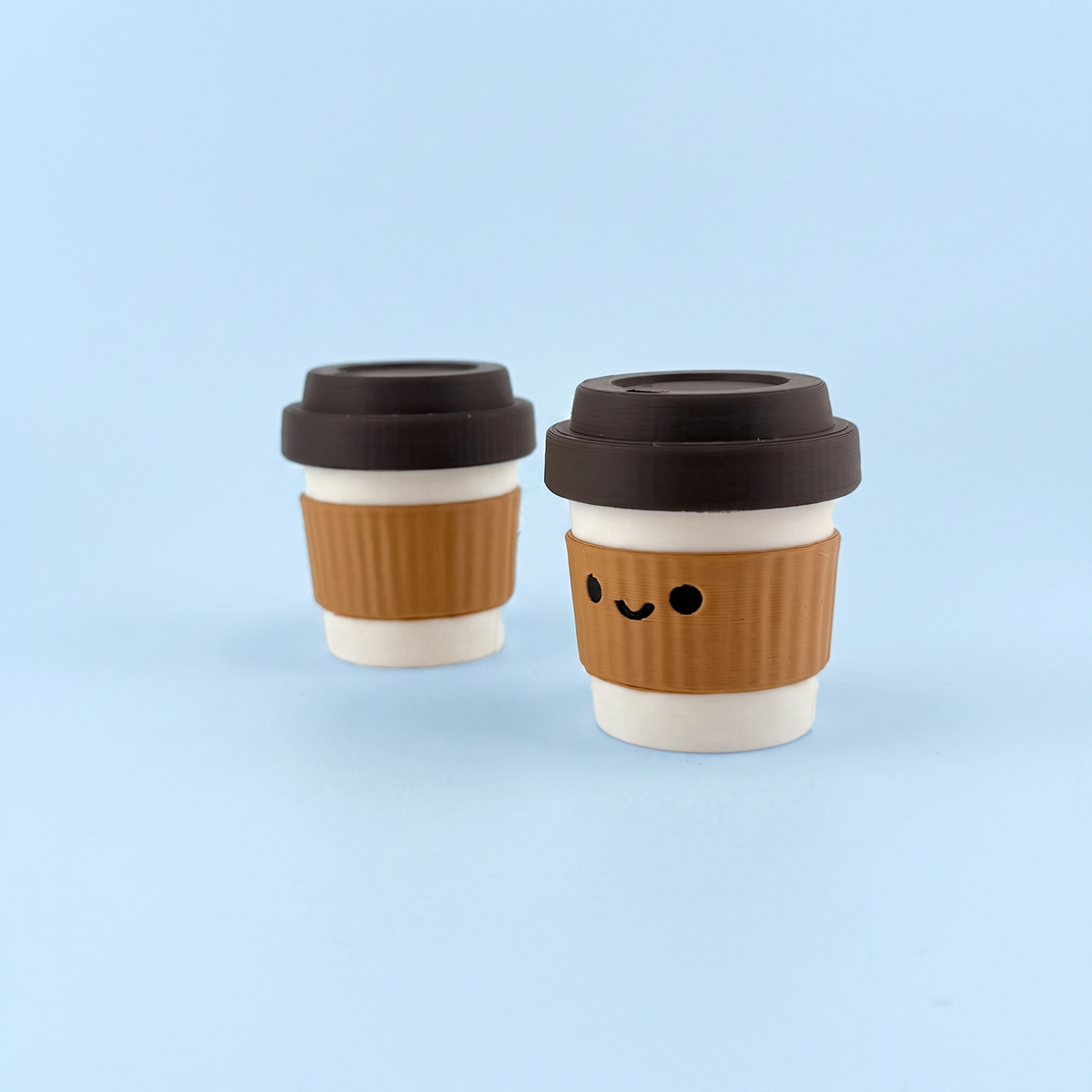 Brown and white takeaway coffee cup fidget clickers