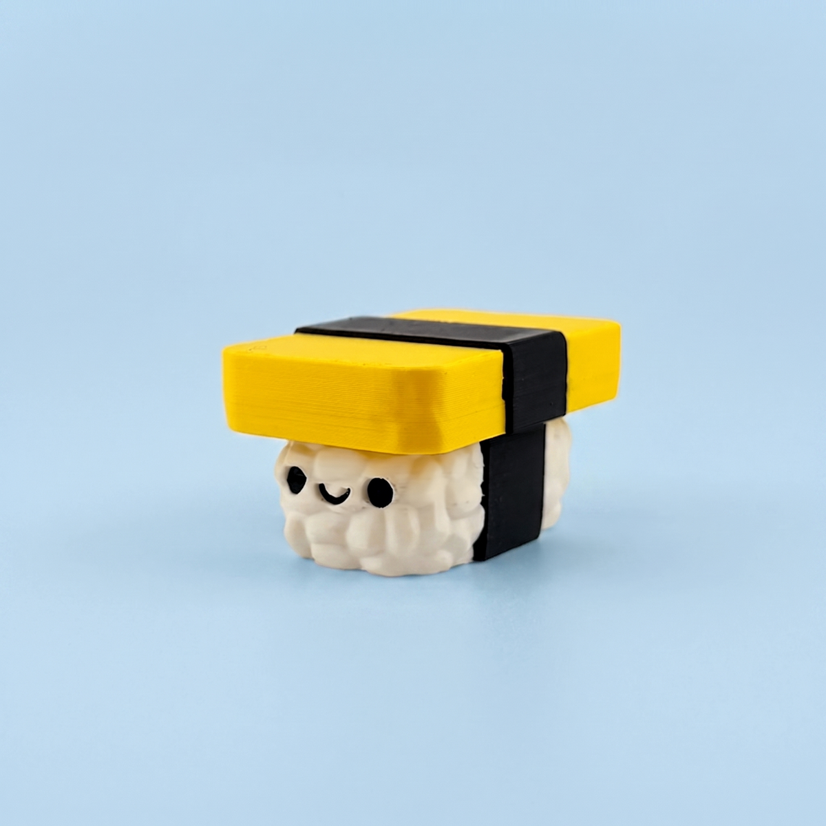 Tamago egg nigiri fidget clicker with a seaweed band
