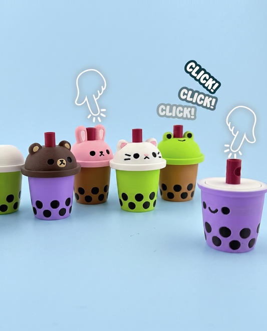 Bubble tea fidget clickers with animal lids being pressed with a click