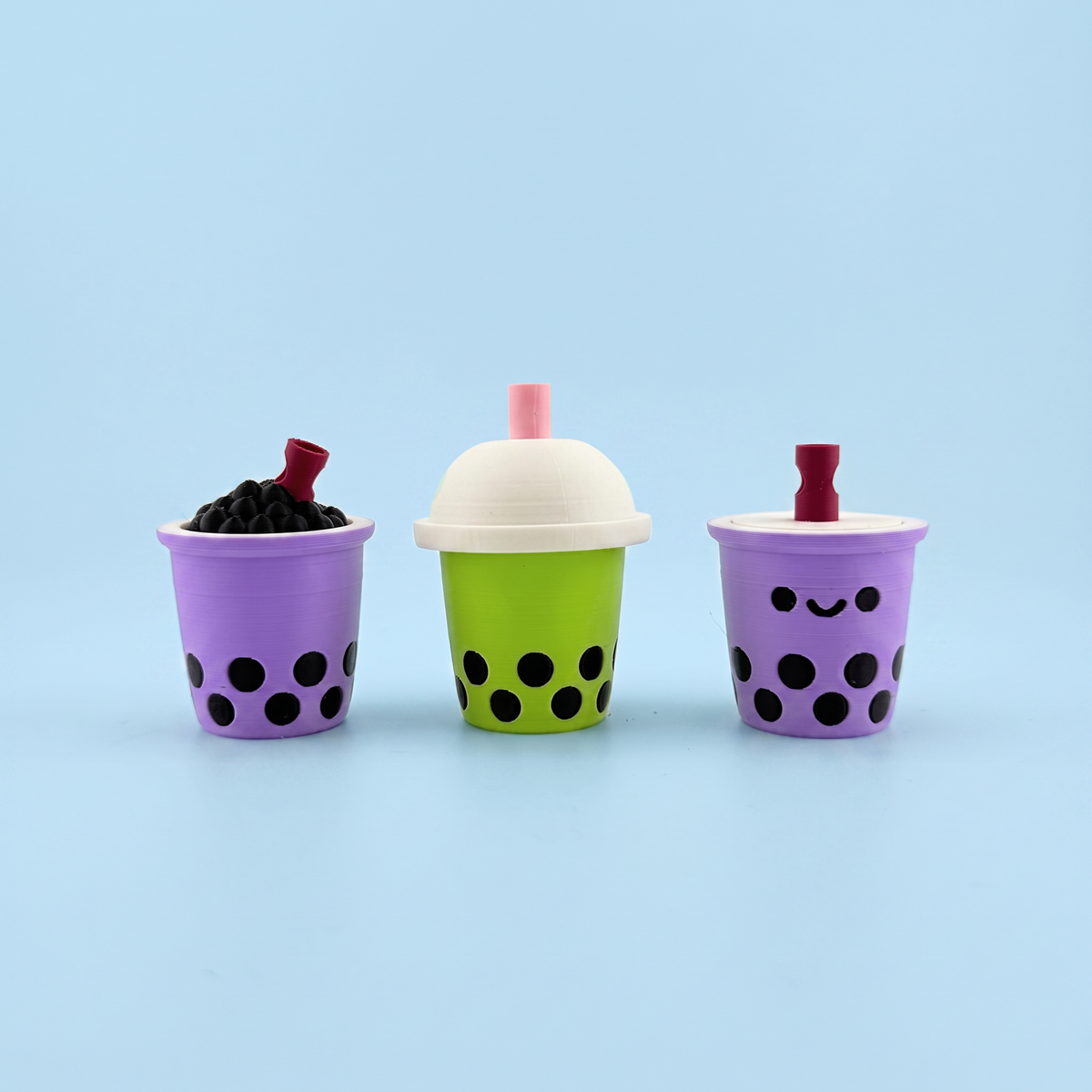 Bubble tea clickers with plain dome and flat lids in lilac and matcha