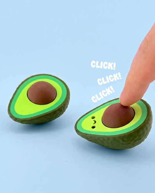 Avocado fidget clicker being pressed with a click