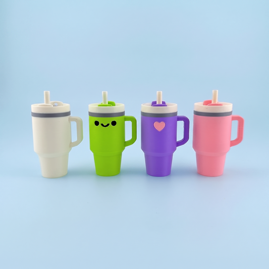 Tumbler fidget clickers in cream, matcha, lilac and pink
