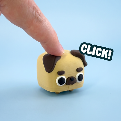 Pug mini pet fidget clicker being pressed with a click