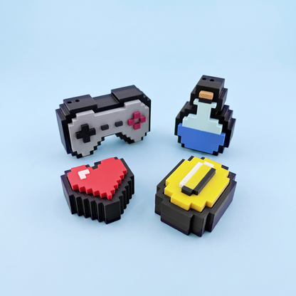 Retro game fidget clickers showing their chunky stepped pixel edges